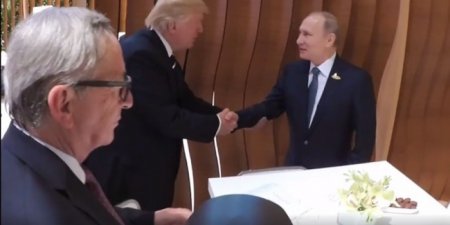 Опубликовано видео рукопожатия Путина и Трампа
