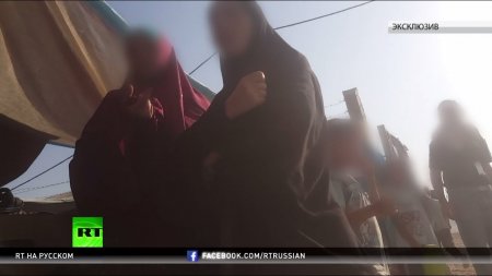 Заложники войны: RT побывал в секретном лагере, где находятся жёны и дети боевиков ИГ